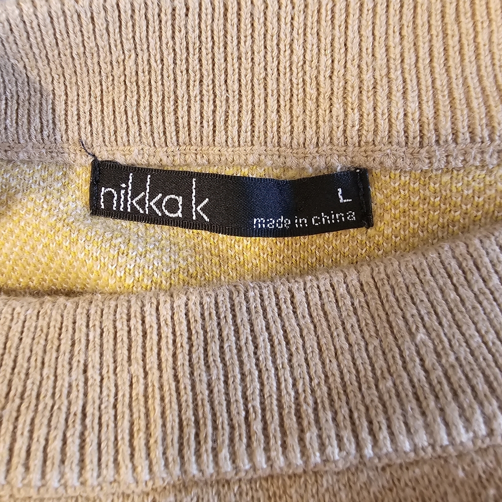 This shirt is tan color white yellow flowers The shirt is in good condition - Picture 3 of 4